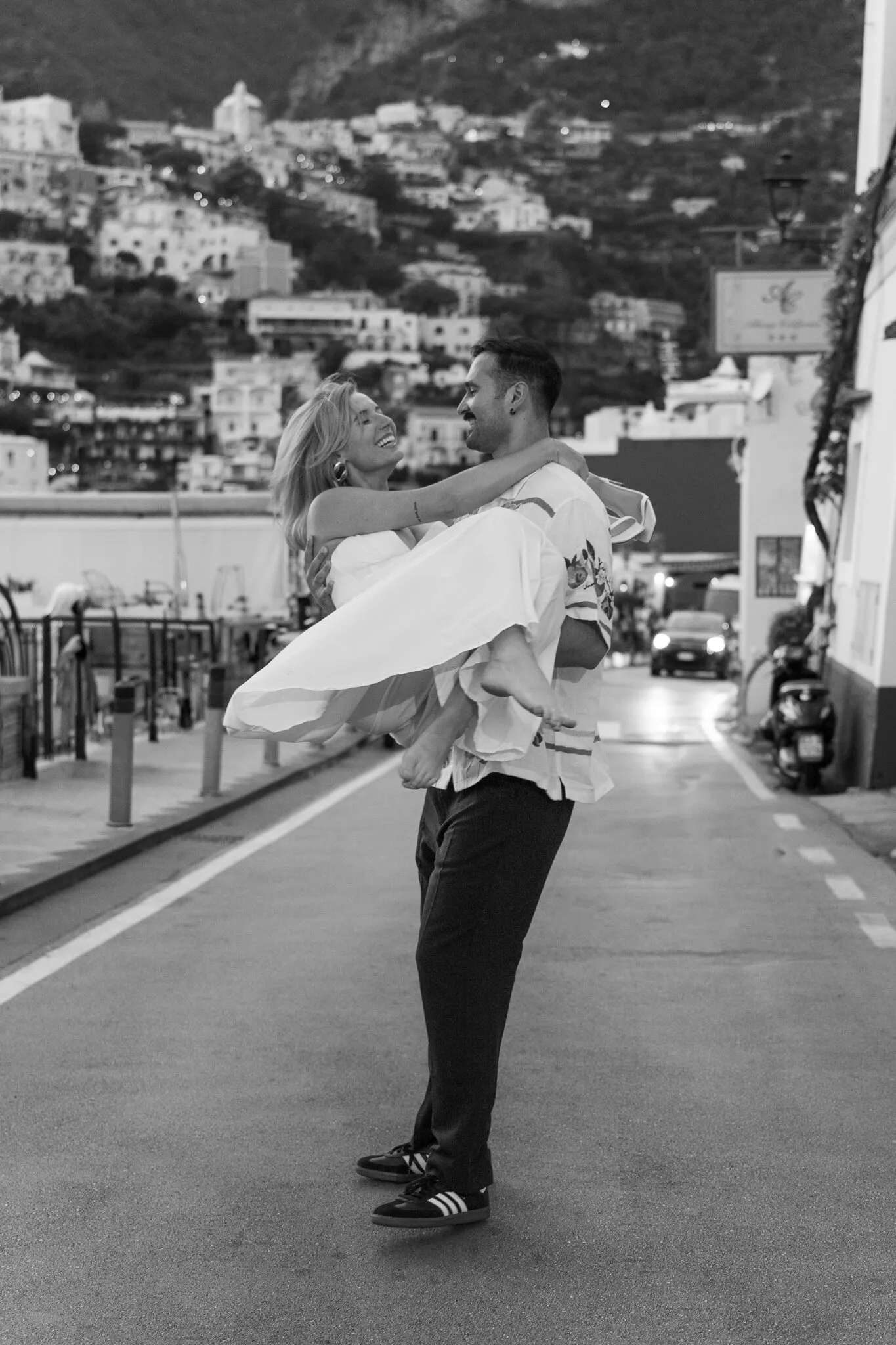 A couple dancing in the street in Positano