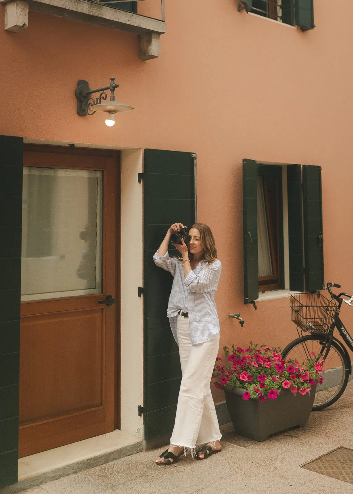 Shelby in a doorway in Venice, Italy